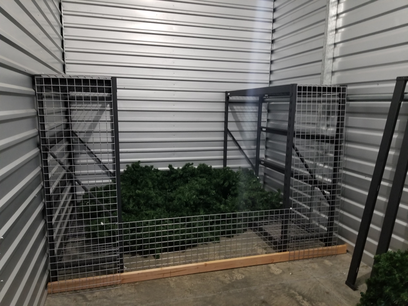 Use the gear I already have! I removed the inner shelves and used these as walls they’re rated at 7000 lbs, so even without a few beams they should easily hold 500lbs of greenery (at most). The wire shelves make for great threahold/gate thingys